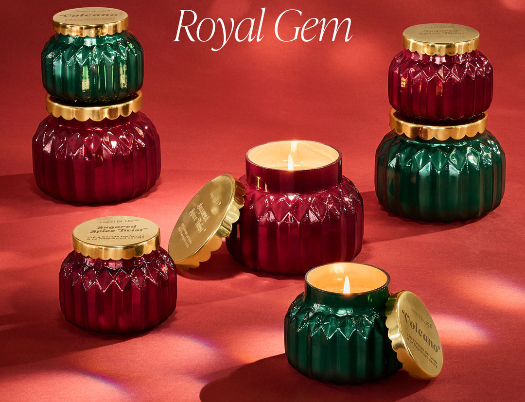 capri BLUE Royal Gem candles on a red background