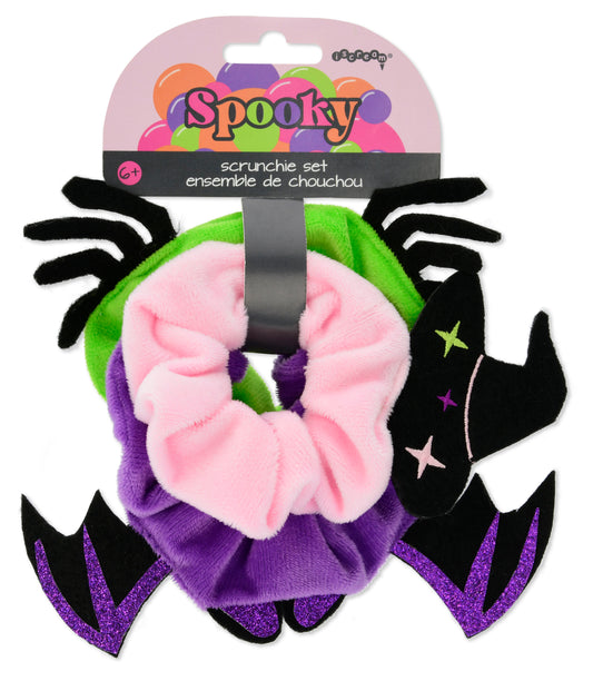 Spooky-themed scrunchie set with pink and purple scrunchies on a white background